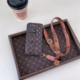 Brown LV Element Phone Case with Floral Print and Crossbody Strap | Sophisticated vibe and built-in card holder for hands-free convenience