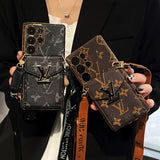 LV-inspired phone case with premium faux leather and precise stitching for Samsung featuring a built-in card holder and boho aesthetic