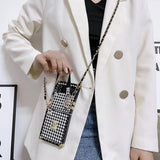 LV-Inspired Trunk Phone Case for Samsung ZFLIP shock-absorbent edges and houndstooth pattern statement piece