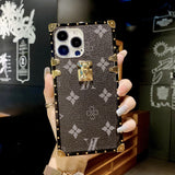 Black LV Trunk Series Phone Case with scratch-resistant matte layer for iPhone and Samsung sleek luxury aesthetic