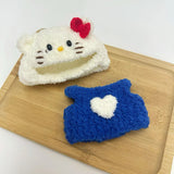 Labubu doll wearing blue Hello Kitty themed outfit