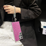 Sparkling pink leopard pattern phone case with convenient wrist strap for Samsung Galaxy S24 Ultra, drop-resistant design