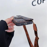 Floral crossbody wallet phone case for iPhone featuring adjustable strap and built-in card holder cottagecore vibe