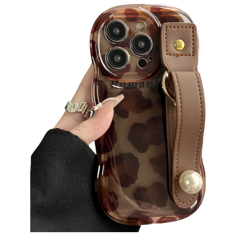 Cheetah print leather phone case with wrist strap for iPhone 14 Plus - stylish animal texture protective cover with secure grip