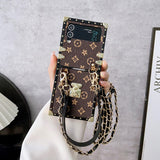 Brown LV Trunk Series Phone Case for Samsung ZFLIP with crossbody strap | statement piece | durable construction | boho aesthetic