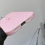 Scratch-resistant pink LV inspired phone case with frosted glass finish and privacy camera cover