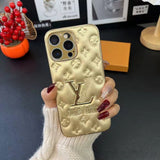 Gold LV Element Phone Case for iPhone with scratch-resistant finish and luxe leather for a sophisticated vibe