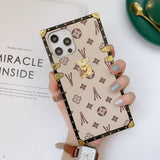 Tan LV trunk inspired phone case with fade-resistant matte finish for iPhone and Samsung, nostalgic vibes and aesthetic statement piece