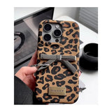 Cheetah print matte phone case with bow for iPhone 14 Plus - stylish animal texture protective cover with premium grip and fingerprint resistance.