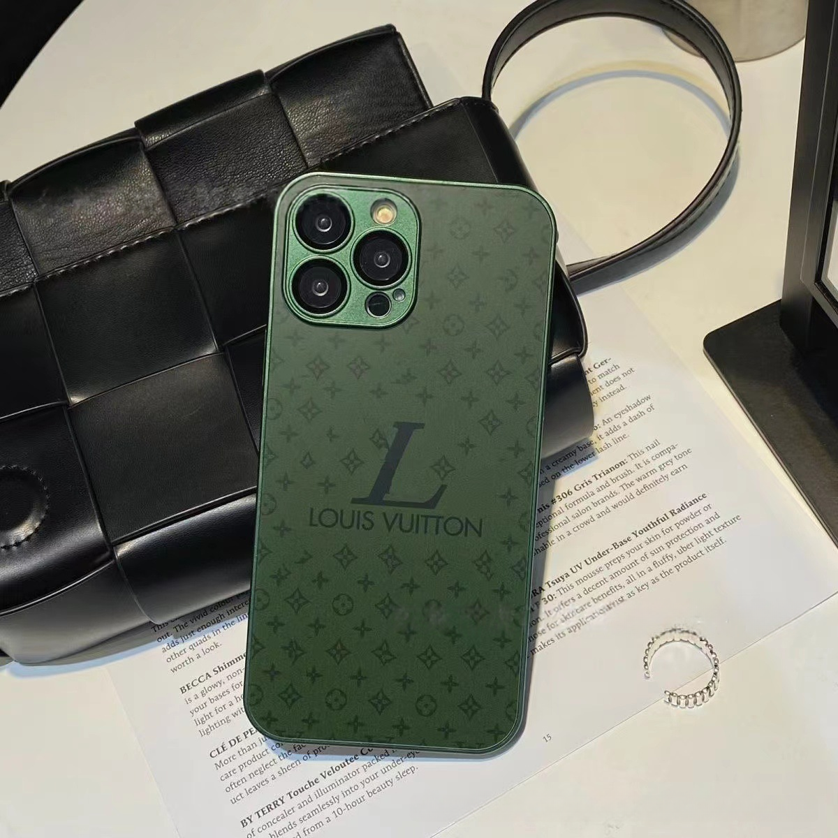 Green LV inspired frosted glass phone case with camera cover minimalist aesthetic statement piece for iPhone 15