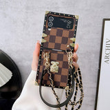 Brown Checkerboard LV-inspired Trunk Series Phone Case for Samsung ZFLIP with Crossbody Strap fade-resistant matte coating and anti-scratch surface for a sophisticated statement piece