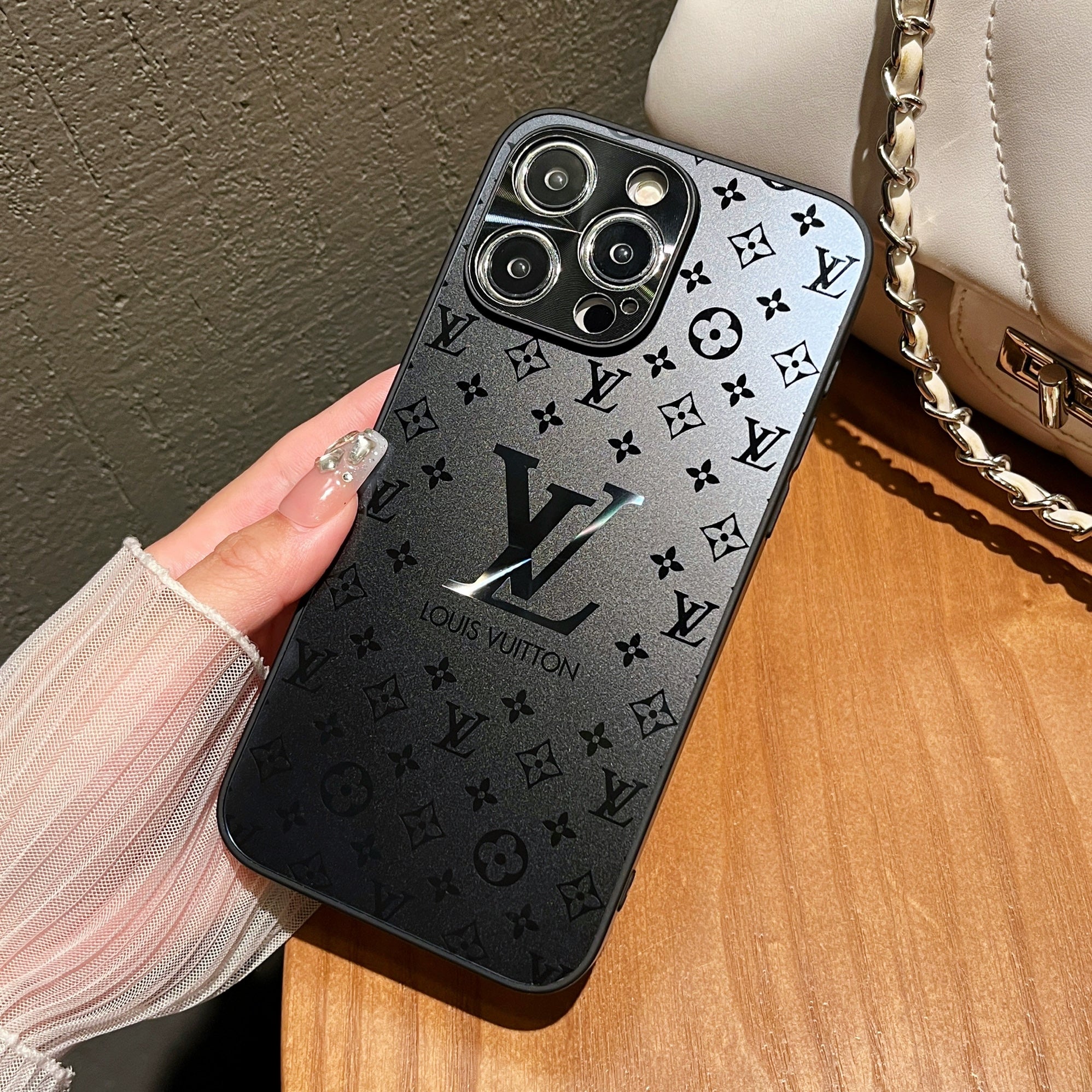 Black LV inspired frosted glass phone case with scratch-resistant finish and camera cover for privacy aesthetic statement piece