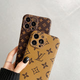 LV inspired phone case featuring scratch-resistant leather and metal finish for iPhone 15 vibe