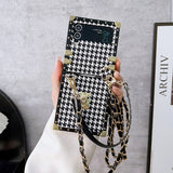 Black White Houndstooth LV-Inspired Trunk Phone Case for Samsung ZFLIP with adjustable crossbody strap boho aesthetic